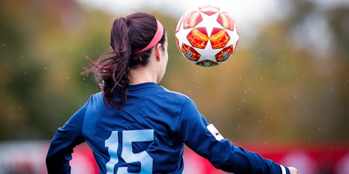 A woman and a football