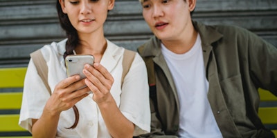 Group of people look at data privacy on their mobile phones in APAC