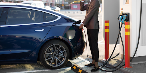 Man charging vehicle