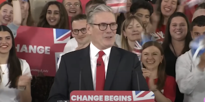 Keir Starmer celebrating general election victory at a rally