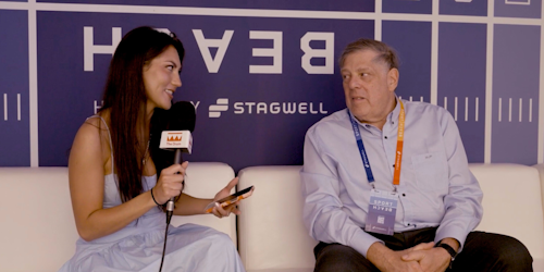 The Drum's Kendra Barnett sits on a couch interviewing Stagwell CEO Mark Penn