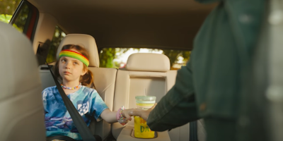 little girl in a car