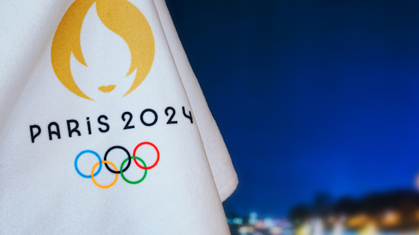 Paris 2024 logo on white flag