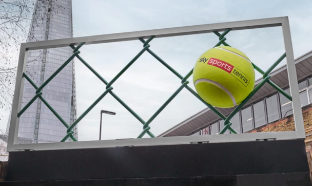 Giant tennis balls on a billboard