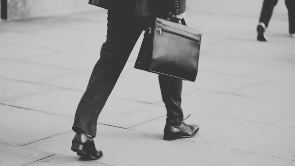 A man in a suit going to the office