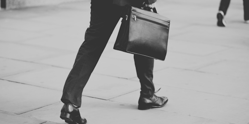 A man in a suit going to the office