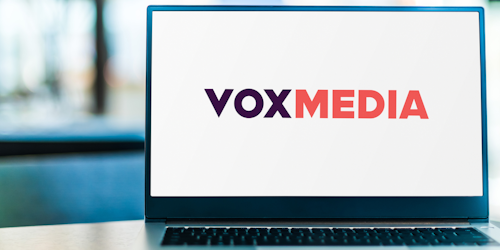 Vox Media logo on laptop screen